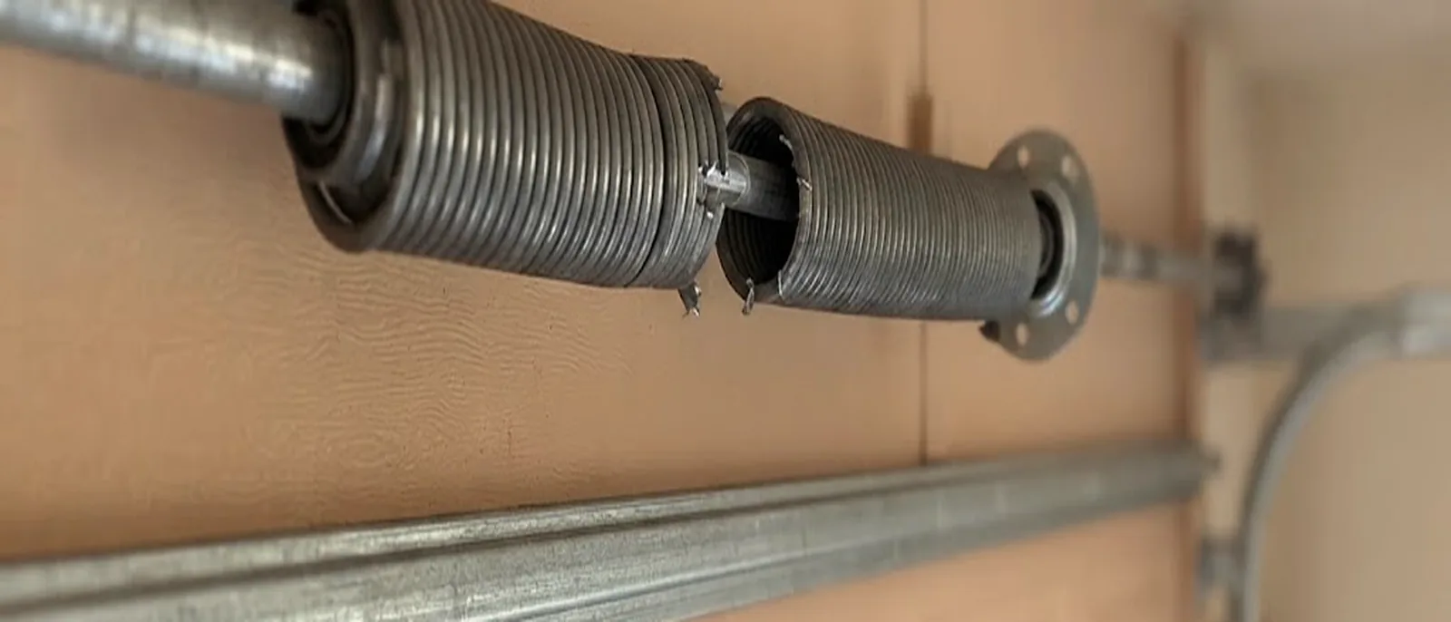 Broken torsion spring above a garage door in Texarkana